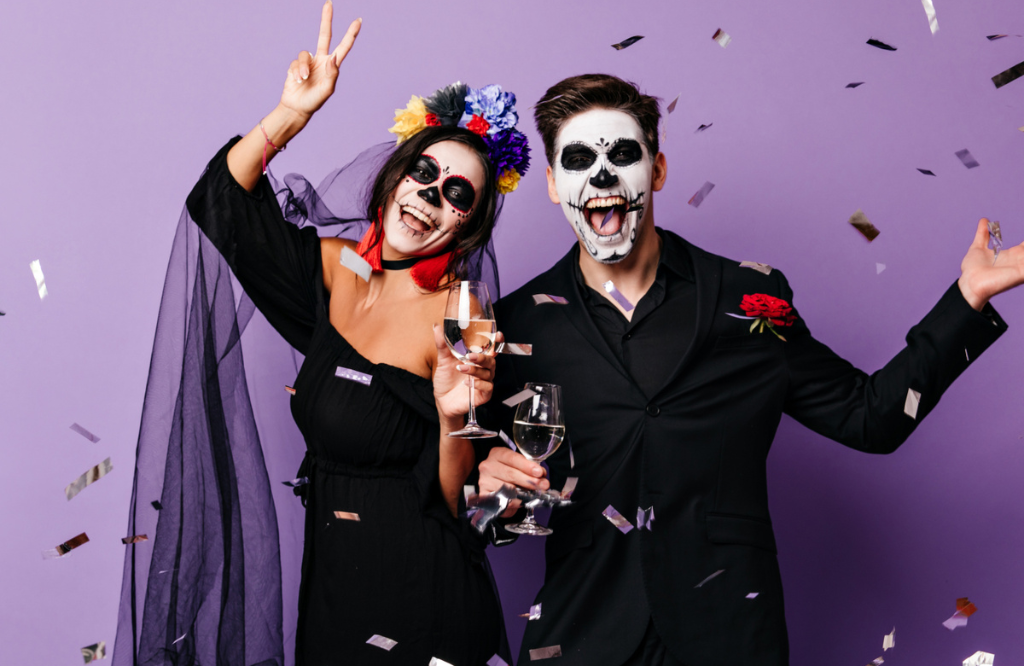 A couple dressing up in safe Halloween costumes as a Halloween Health and Safety Tip