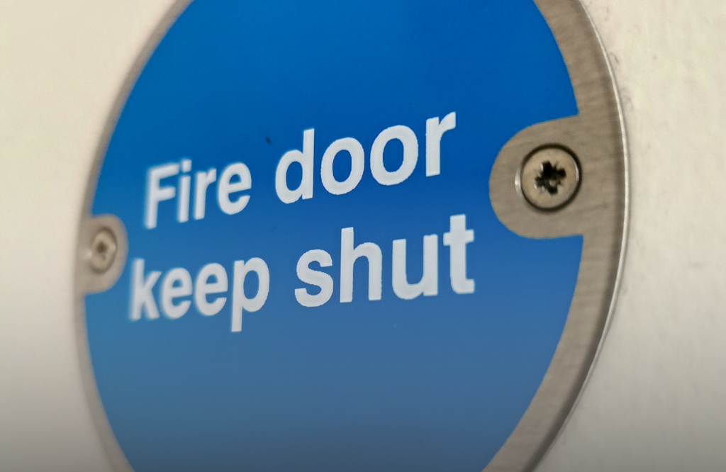 Fire Door Keep Shut signage