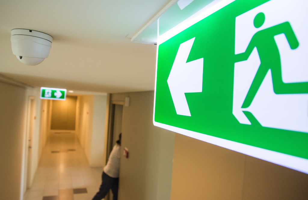 Fire signage showing access to the fire doors