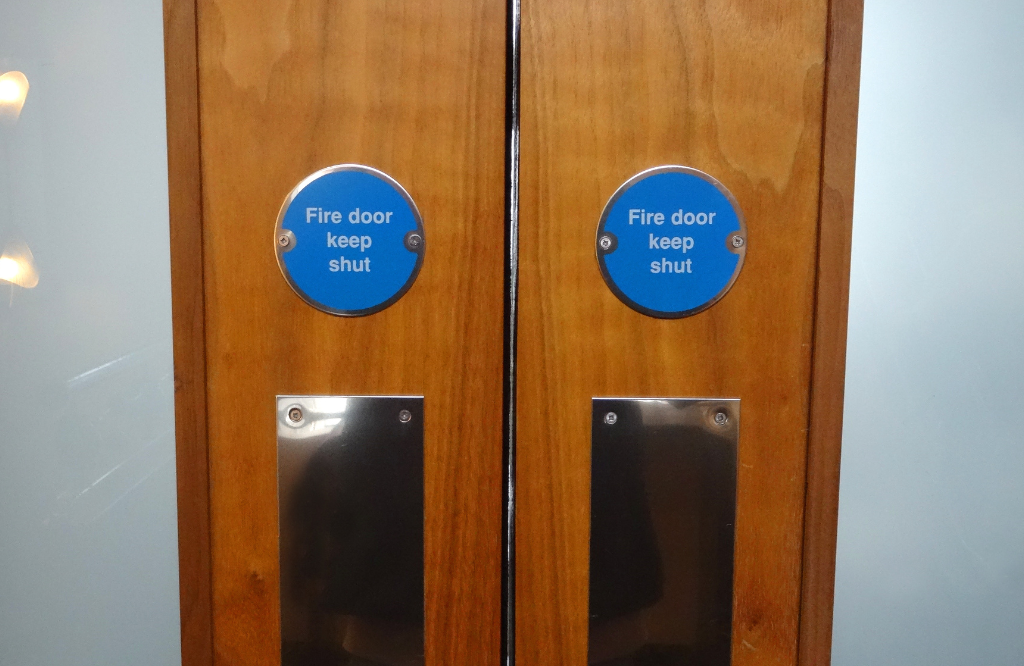 two closed fire doors after a fire door inspection