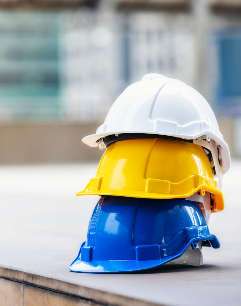 three hard hats stacked on top of each other