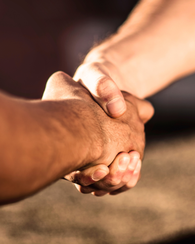 A handshake between the health and safety supervisor and client