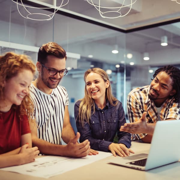smiling employees after receiving hr support
